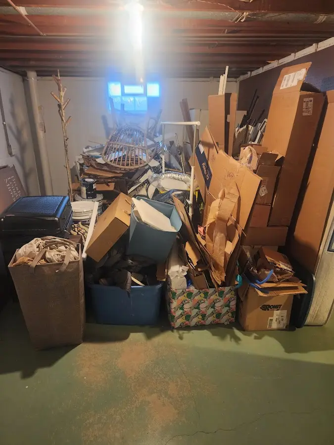 Roll-off dumpster container at job site for 20 Yard Dumpster Rental in East Riverdale